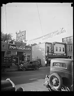 1936 image of pawnshop and Roosevelt presidential campaign banner