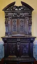 Cupboard; c.1570; wood; height: 246 cm; Château d'Écouen[50]