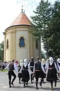Traditional dance next to the church building