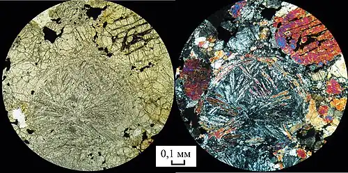 The meteorite under microscopic view (scale: 0.1 mm (1⁄250 in))