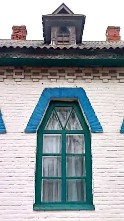 Fragment of the façade of the school in Ostapivka