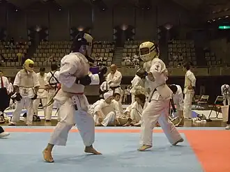 Image 48Bōgutsuki, a form of full-contact karate fought with armour, one of the competition formats for kumite (from Karate)