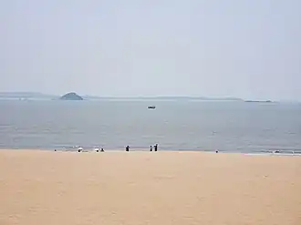 View of Binlang Islet from Xiamen's One country, two systems beach (center left)