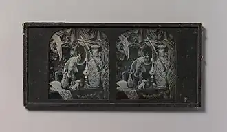 Still-life with Cockatoo, Mirror, Ornamental Ball, Vases, and Lace