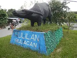 Kneeling Carabao Statue in Longos