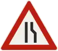 114-10 – Road narrows from the right (formerly used )