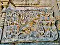 Panels show Ramayana and Mahabharata scenes, but much has been mutilated and defaced