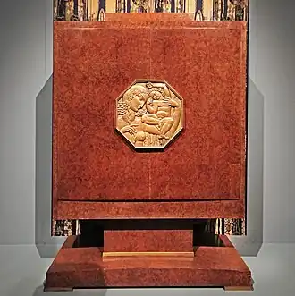 Art Deco octagon-shaped medallion on a makeup cabinet, medallion by Alfred Janniot and cabinet by Jacques-Émile Ruhlmann, c. 1929