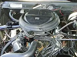 Shows the engine compartment of a 1973 Javelin with a 401 "Go Pac"