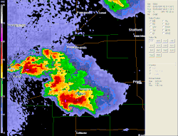 A radar image sequence of the tornado at EF5 intensity, marked as a purple and later red triangle, tracking towards Greensburg before lifting. A distinct hook echo is visible.