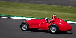 Leclerc driving the Ferrari 375 F1 before the 2021 British Grand Prix