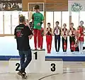 Victory ceremony for the cantonal champion in program 2 with a green jersey for the leader in the Ostschweizer Cup[15]