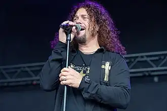 Manzi performing with Sweet in 2023.