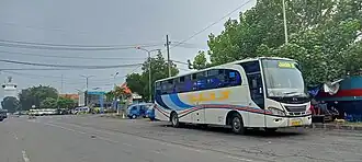 An intercity bus unit across Java–Madura via Suramadu owned by PO Akas IV is waiting for its departure schedule from in front of Ujung Port, May 30, 2021.