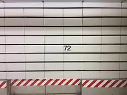 The trackside tiles at the 72nd Street station