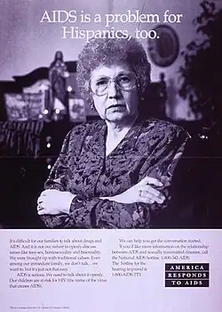 Black and white poster. Title at top of poster. Visual image is a b&w photo reproduction featuring an older woman. She stands with her arms crossed. Lengthy caption below photo acknowledges the difficulty of talking about drugs and sexual behavior in Hispanic families and stresses the importance of speaking openly about these subjects as children are at risk.