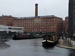 Old Mill as seen from the banks of the New Islington canal