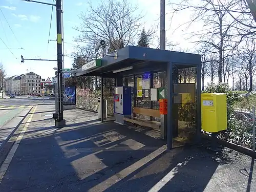 Shelter next to city street with inlaid track