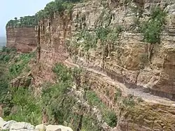 Accessing Daba Selama monastery requires a perillous climb.