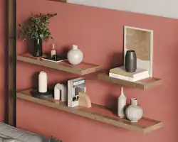 Modern, heavy-duty floating shelves installed in a contemporary living space. Shelfology®