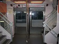 MI 2N "Altéo" interior, mid-deck showing the wide entry doors, and stairs to upper and lower decks