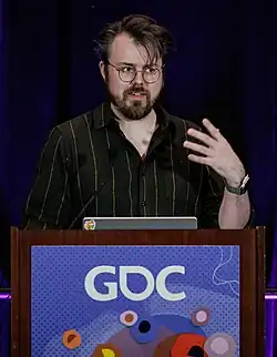 Man speaking at podium