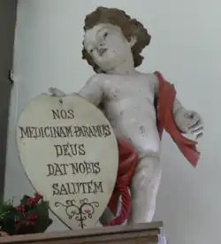 Angel with the Pharmacy's slogan