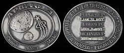 Apollo 14 mission emblem and crew names (front). Dates (launch, lunar landing, and return) (back)