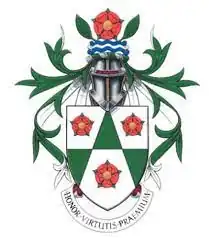 The previous Arnold School coat of arms, incorporating the red roses of Lancashire