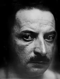 Arnold Fiechter (1879–1943) Maler und Lehrer für Farbenlehre und Malerei an der Gewerbeschule in Basel. Fotograf und Aufnahme Ort unbekannt. Die Fotografie befindet sich im öffentlich zugänglichen Staatsarchiv Baselland in Liestal, Schweiz.