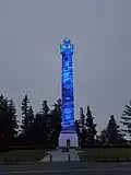 The column in blue lighting