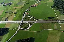 A parclo AB2, or folded-diamond interchange along Bundesautobahn 7 in Germany 47°38′28.68″N 10°31′40.08″E﻿ / ﻿47.6413000°N 10.5278000°E﻿ / 47.6413000; 10.5278000