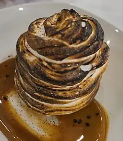 Toasted meringue of a baked Alaska at a restaurant