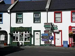 The junction at the centre of Ballyvaughan, still featuring the full signpost.