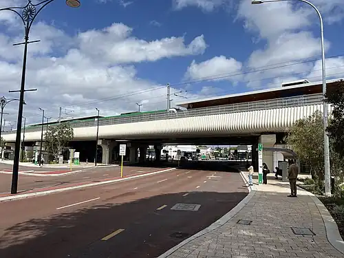 Bayswater station platform with a train