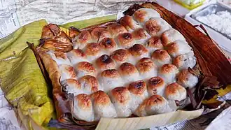 Bibingkoy, grilled glutinous rice dumpling filled with sweetened mung bean paste