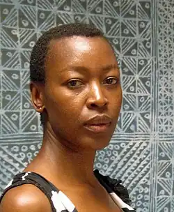 Photo of a black artist facing the camera