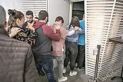 People entering the BlackOut dark restaurant