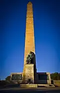 Sculpture and obelisk