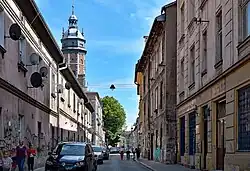 View from the intersection with Rabina Meiselsa Street to the south. On the left is the former inn, further on the tower of the Corpus Christi Church is visible. The last plan is the Hospital of the Brothers Hospitallers.