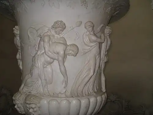 Satyr holding a thyrsus, supporting a drunken ivy-wreathed silenus, from the Borghese Vase, 1st century BC (Louvre)