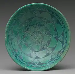 Ancient Egyptian bowl; 200–150 BC; faience; 4.8 cm × 16.9 cm (1.9 in × 6.7 in); Metropolitan Museum of Art (New York City)