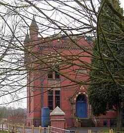 The pumping station from the north, showing ornate brickwork and pinnacles.