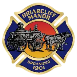 Fire department cross depicting horse-drawn fire engine