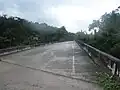 Slanted bridge over Río Culebrinas between Magos barrio and Calabazas barrio
