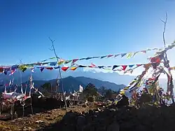 Buddhist prayer flags fluttering inside Pathibhara Devi Temple premises