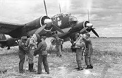 Nazi-era photo with KG 51 insignia on a Ju 88 bomber.