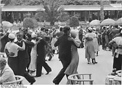 Couples share quality time through dance in Berlin, Germany, 1925.