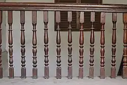 The craftsmanship of the mahogany wooden staircase at Burdwan House.