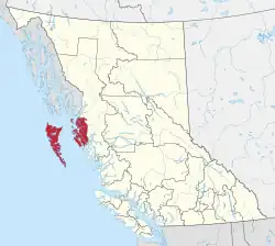A map of British Columbia depicting its 29 regional districts and equivalent municipalities. One is highlighted in red.